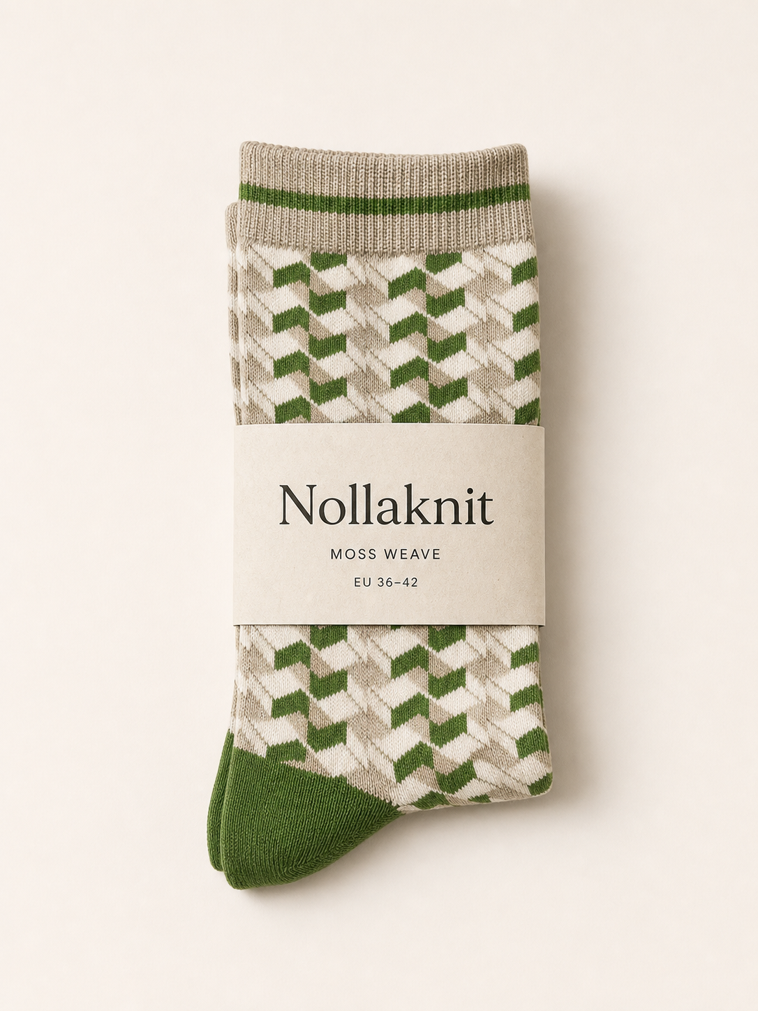 Moss Weave socks folded with a minimal Nollaknit paper band